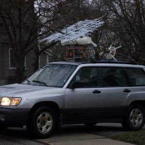Matrix of Beauty, original handmade freestanding LED light sculpture by Lumencrafter, sits atop our old Subaru Forester, making the journey to L.E. Shore Library, Thornbury for the the Grey Highlands Artists Collective 2017 exhibition, Sacred Spaces: Altars by Artists. Cedar tree skeleton hung with four square light towers and overlaid with a grid of narrow polycarbonate strips.