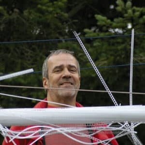 22-foot-long pendant LED light sculpture, changing colours. LED lights run through three acrylic tubes joined with heavy gauge wire, wrapped with strips of steel mesh and polycarbonate. stunning; completely original.