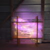 original LED light sculpture, violet-pink and white light, free-standing, slightly more than 2 feet square, glows against corrugated steel