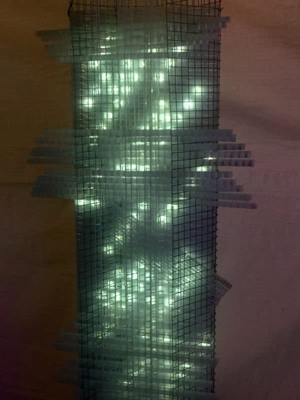 Solar Thing, unique solar-powered hand-made pale green four-foot long LED light sculpture by Lumencrafter, close-up, at the Grey County Autumn Leaves Studio Tour, Rocklyn, Ontario.