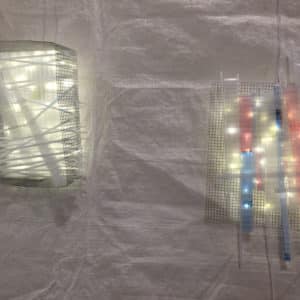 Two droll LED light sculpture wall sconces by Lumencrafter, Box#1 and Shatter#1, at Sourceworks Ceramics Studio for the 2018 Grey County Autumn Leaves Studio Tour.