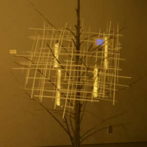 Matrix of Beauty, original handmade freestanding LED light sculpture by Lumencrafter at the Grey Highlands Artists Collective 2017 exhibition, Sacred Spaces: Altars by Artists at The Gallery, L.E. Shore Library, Thornbury. Cedar tree skeleton hung with four square light towers and overlaid with a grid of narrow polycarbonate strips.