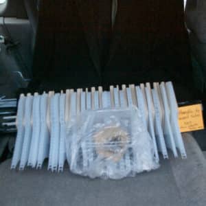 ready for transport to The Gallery, L.E. Shore Library, Thornbury, Weight of Beauty, an LED wall-mounted light sculpture by Lumencrafter, sits on the back seat of our old Subaru. Carefully wrapped, a preserved blossom rests on layers of vertical polycarbonate which will glow magenta-pink at the 2017 Grey Highlands Artists Collective exhibition, Sacred Spaces: Altars by Artists.