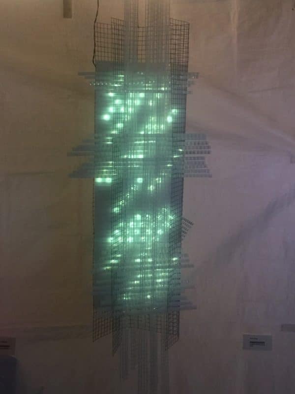 Solar Thing, unique solar-powered hand-made pale green four-foot long LED light sculpture by Lumencrafter, close-up, at the Grey County Autumn Leaves Studio Tour, Rocklyn, Ontario.